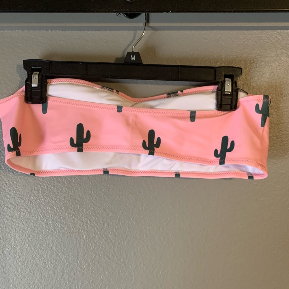 Two piece cactus themed bathing suit.